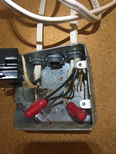 closing a hole in a junction box|covering unused holes in box.